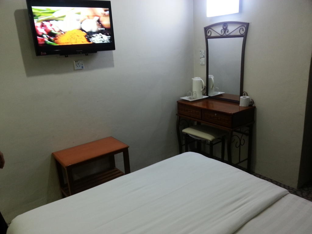 Oriental Inn Кучінг Номер фото