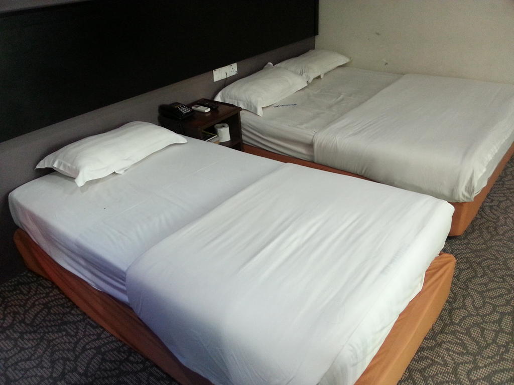 Oriental Inn Кучінг Номер фото