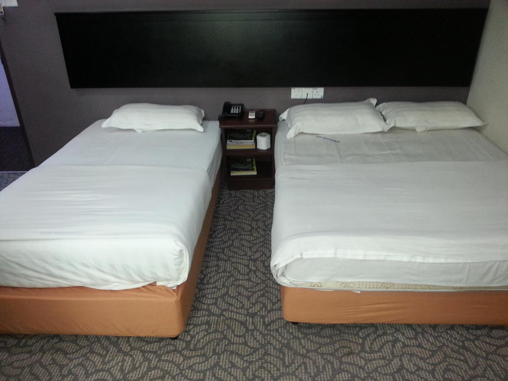 Oriental Inn Кучінг Номер фото