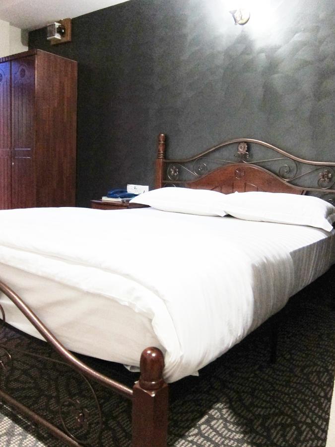Oriental Inn Кучінг Екстер'єр фото