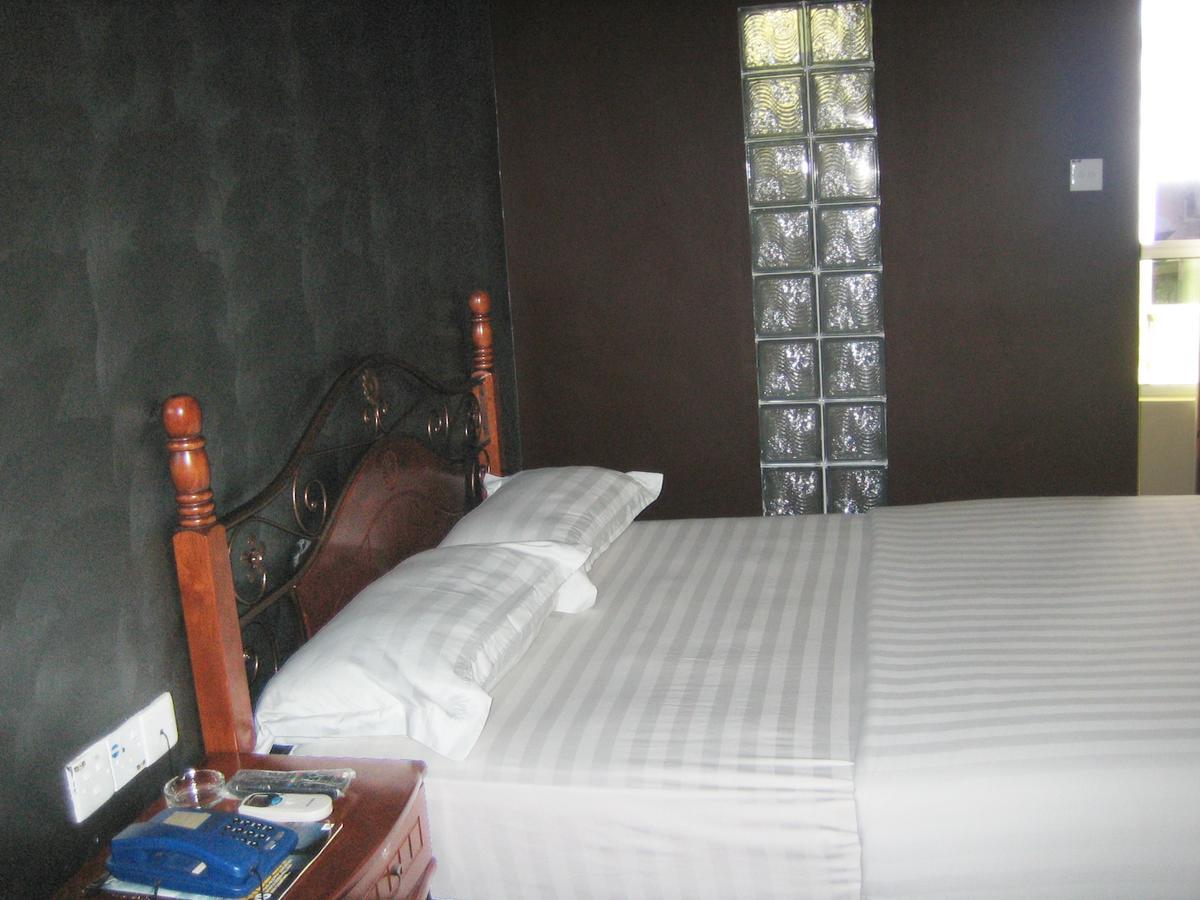 Oriental Inn Кучінг Екстер'єр фото