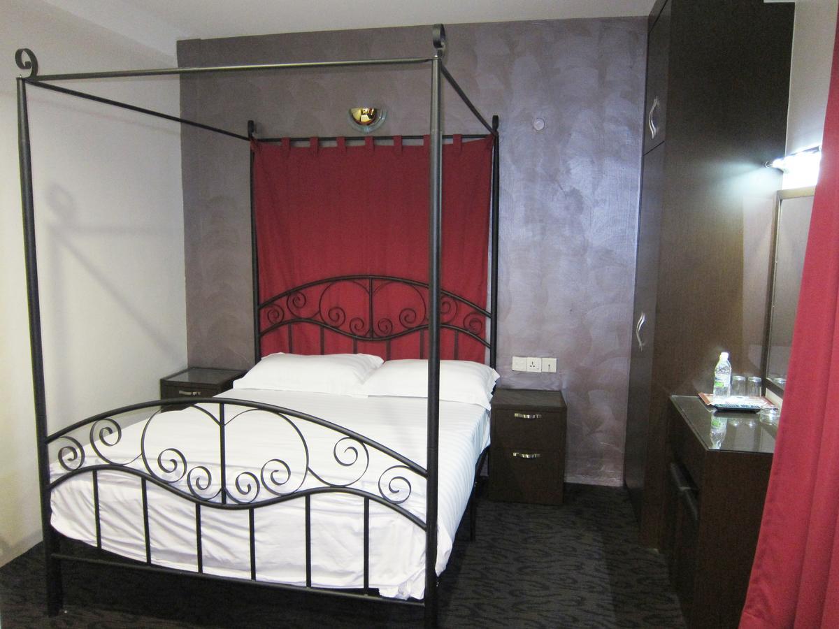 Oriental Inn Кучінг Екстер'єр фото