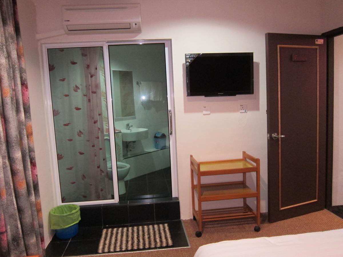 Oriental Inn Кучінг Екстер'єр фото